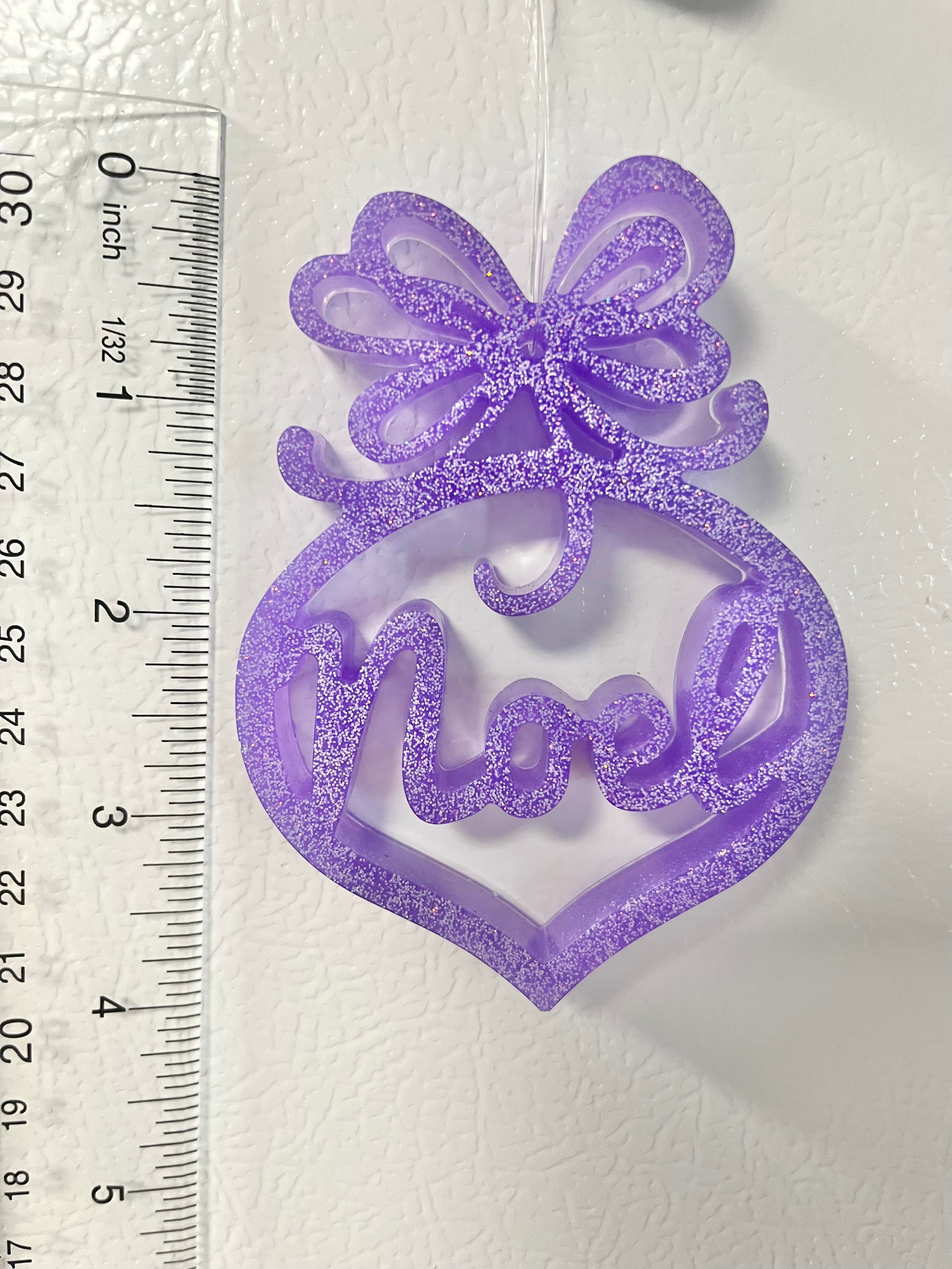 Purple with white glitter Noel ornament