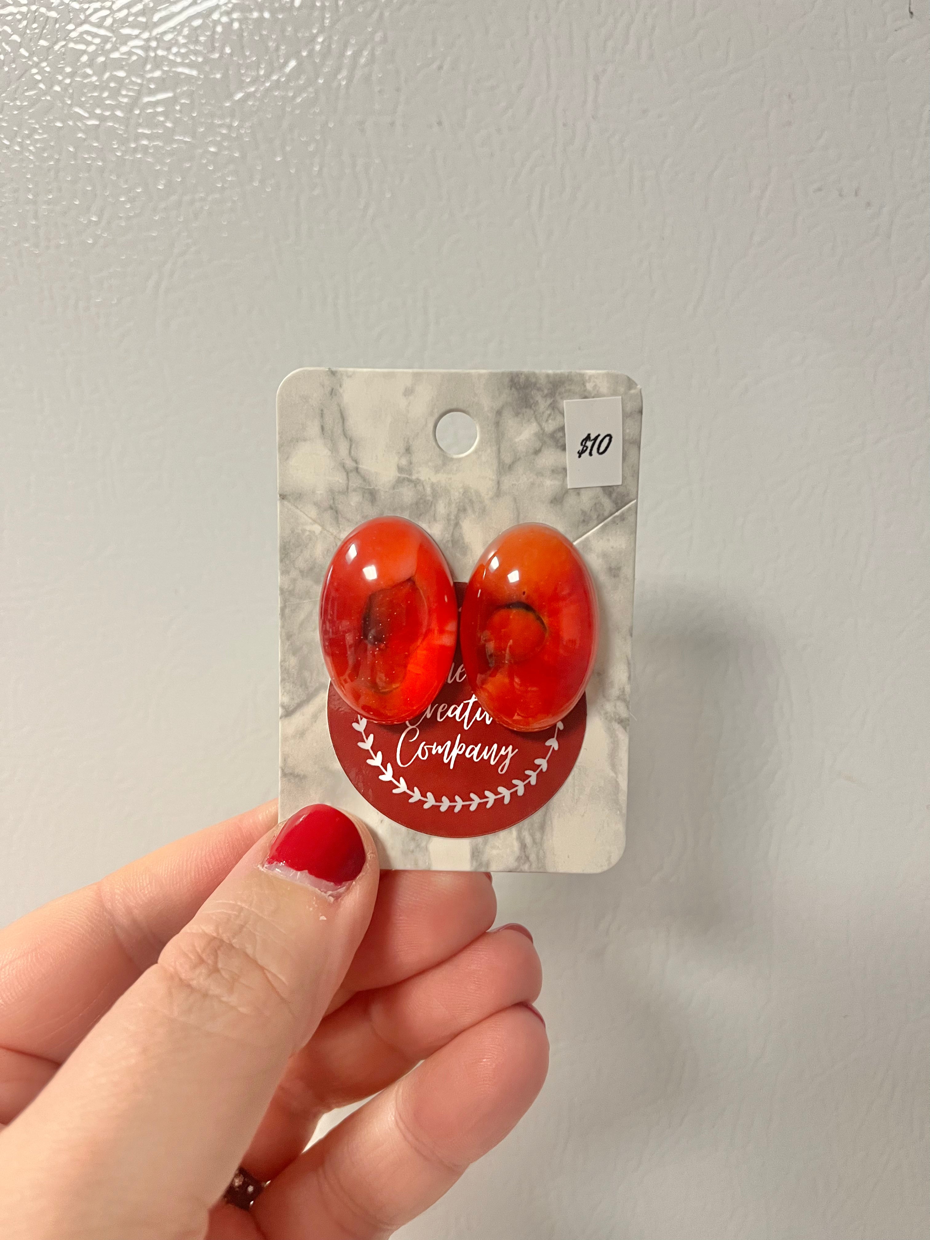 Red oval earrings