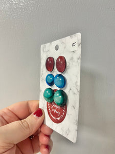 Red, blue, and green earring set