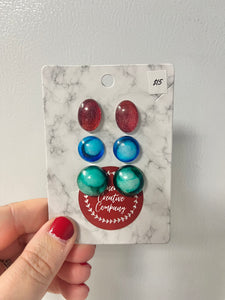 Red, blue, and green earring set