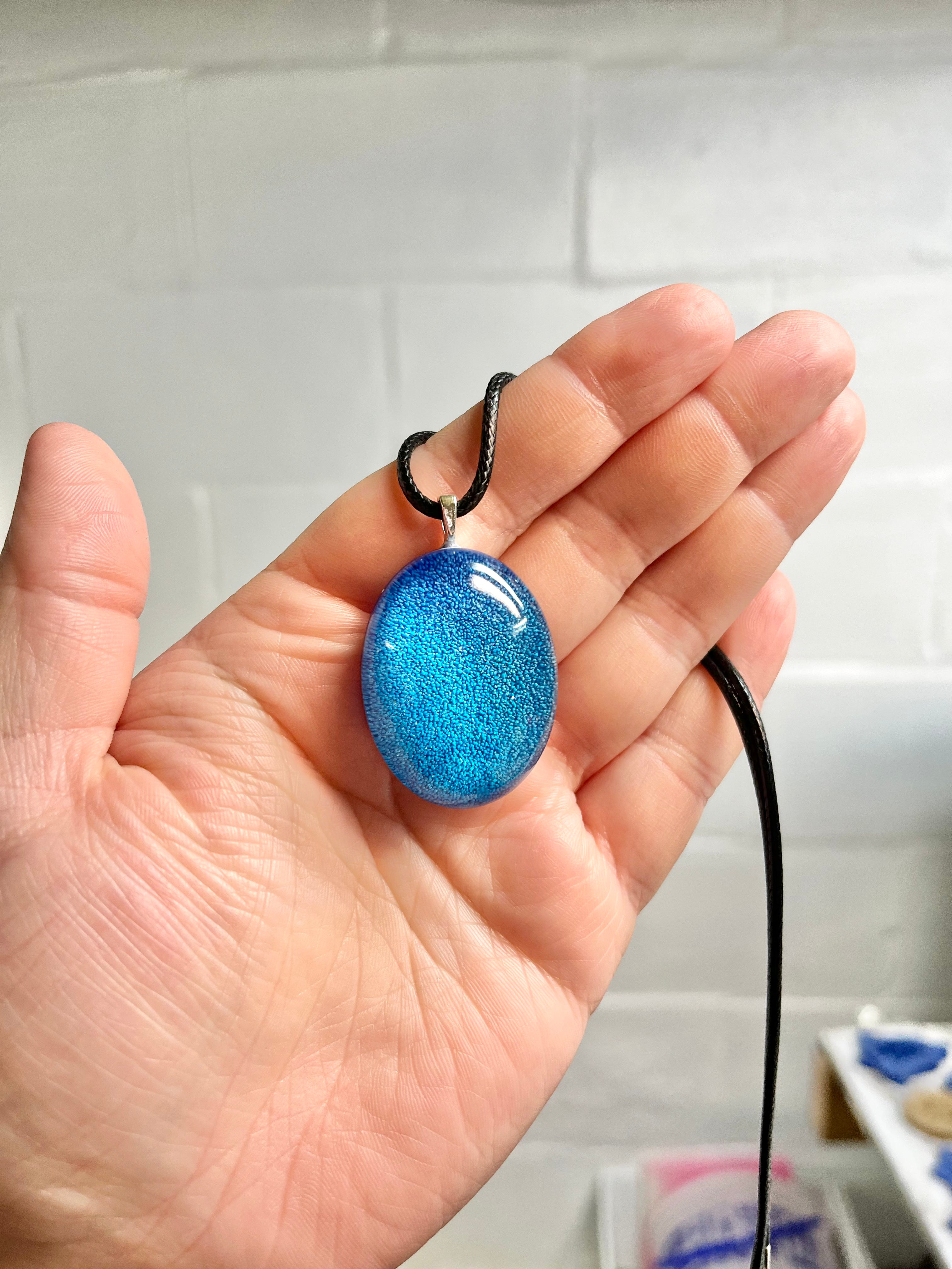 Blue oval pendant necklace