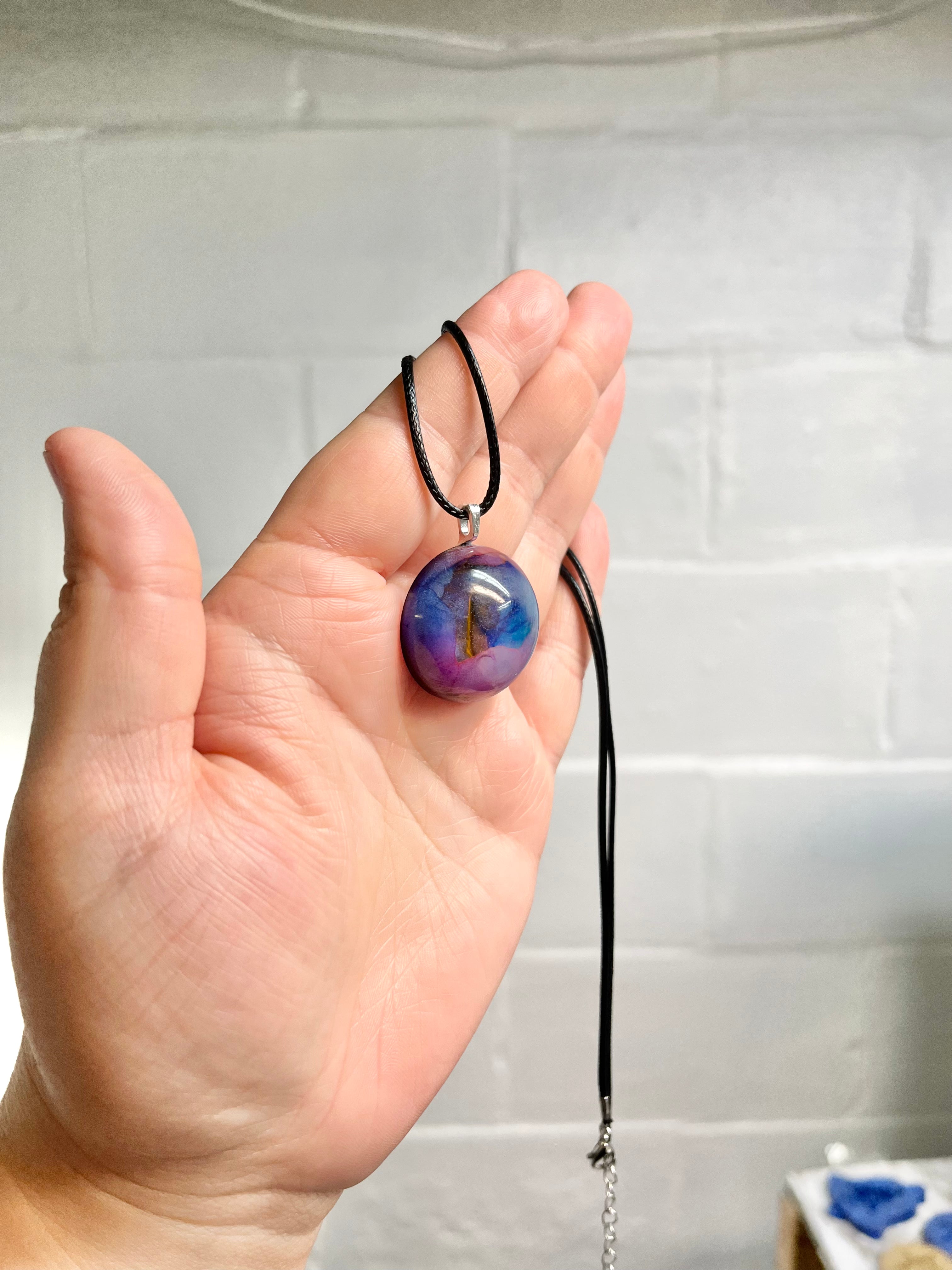 Blue and pink round pendant necklace