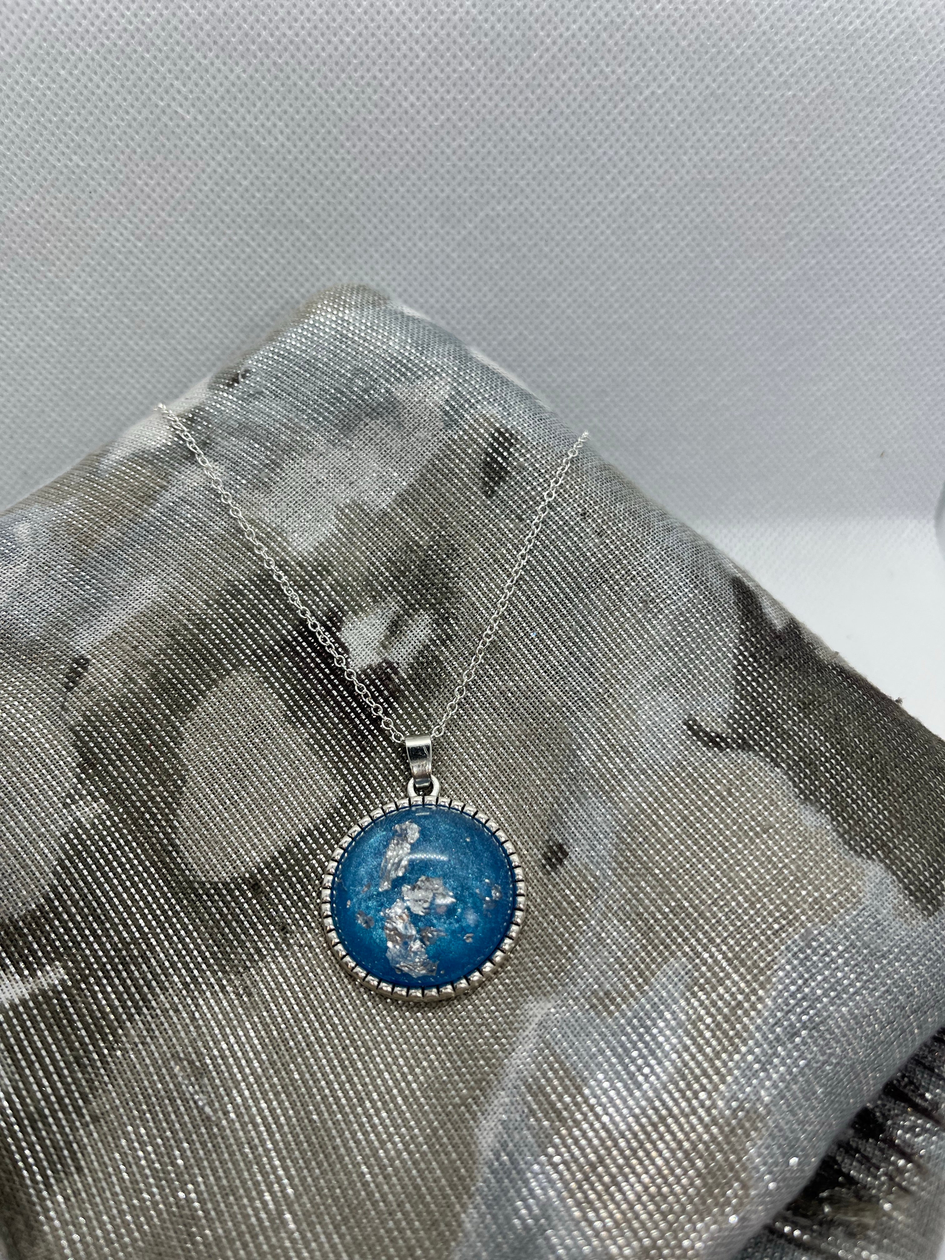 Blue and silver pendant necklace