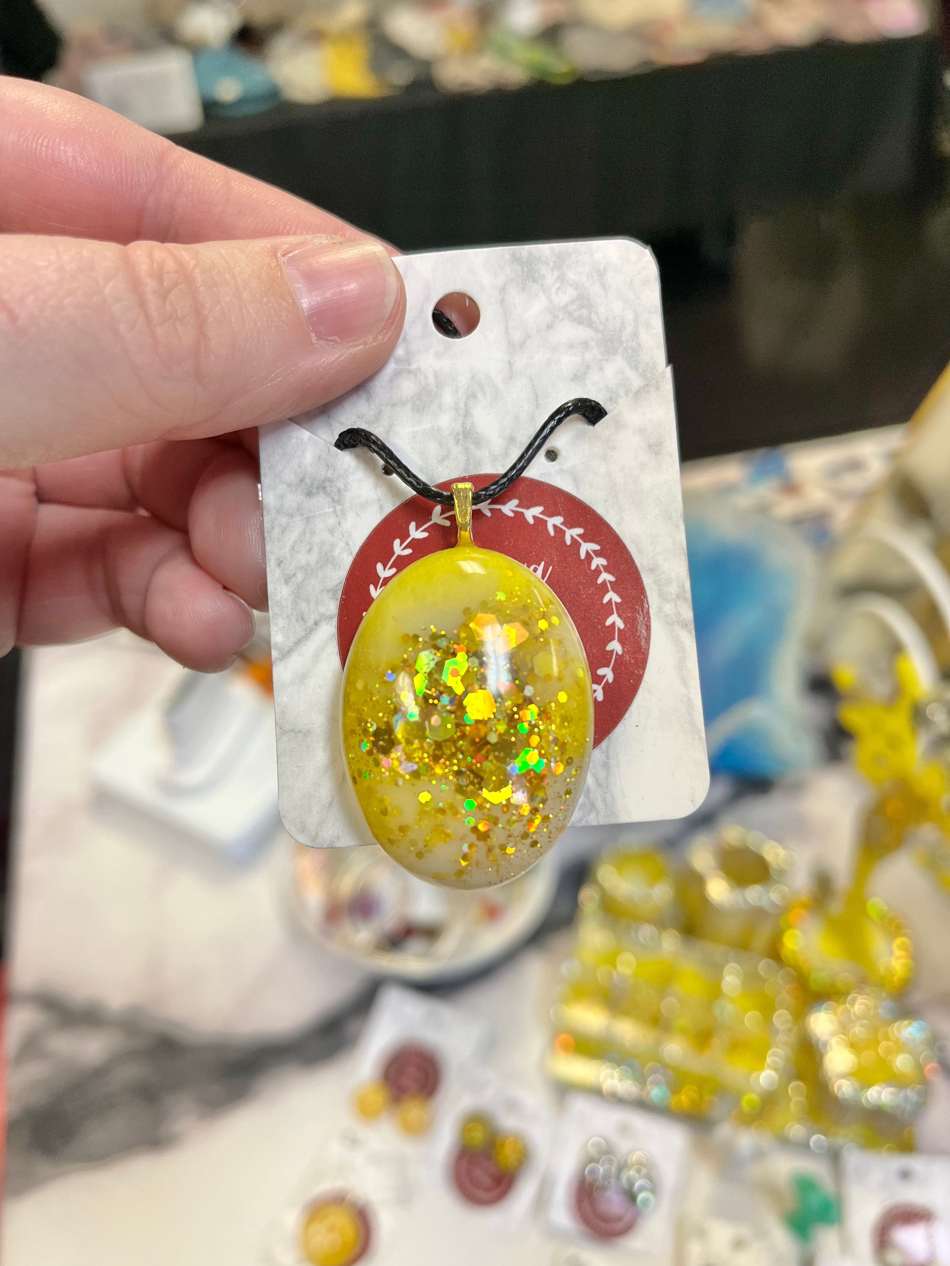 Yellow glitter oval pendant necklace