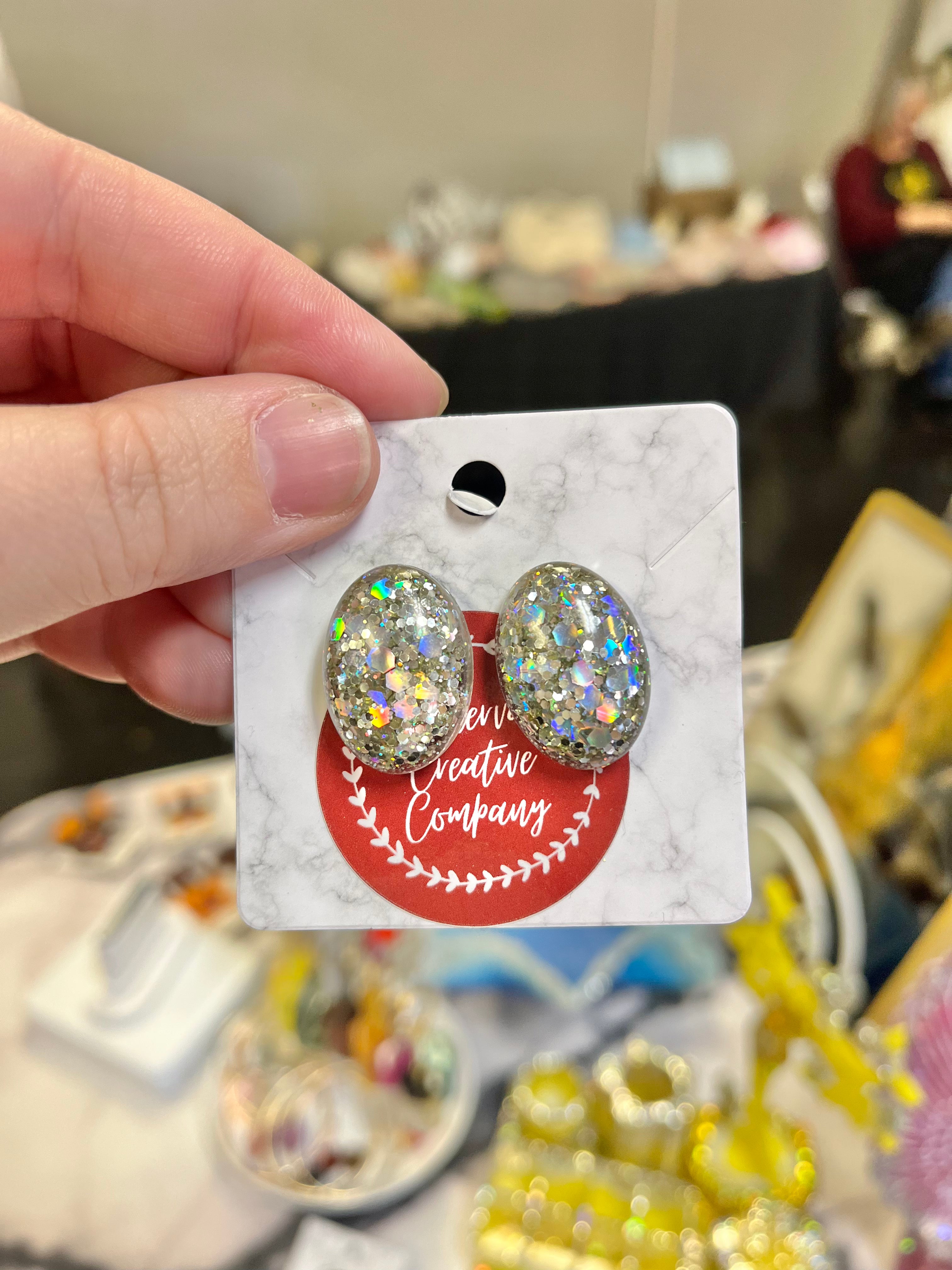 Silver glitter oval earrings