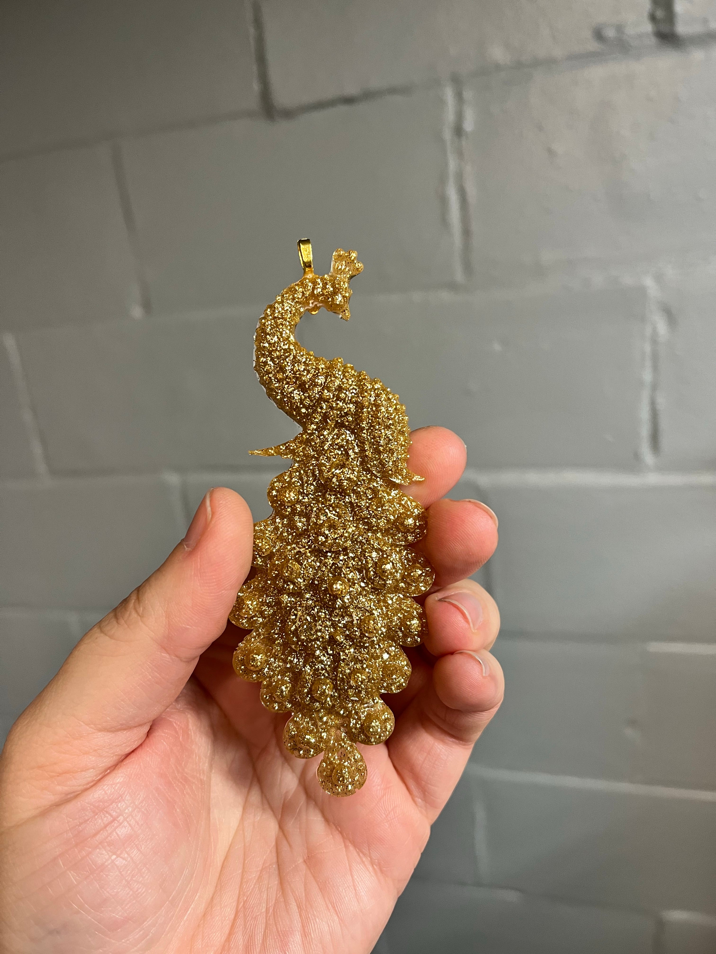 Gold peacock Christmas ornament